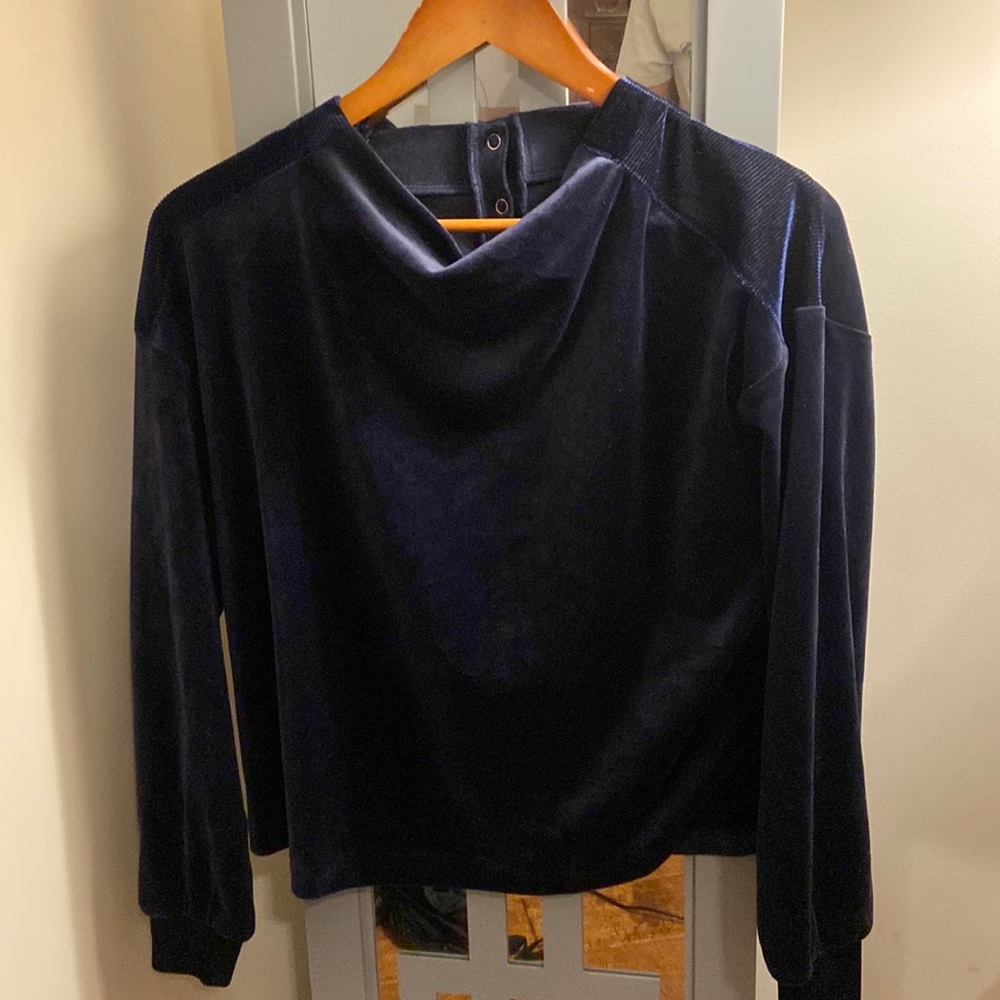 Navy Velour sweatshirt with ribbed shoulders and cuffs.